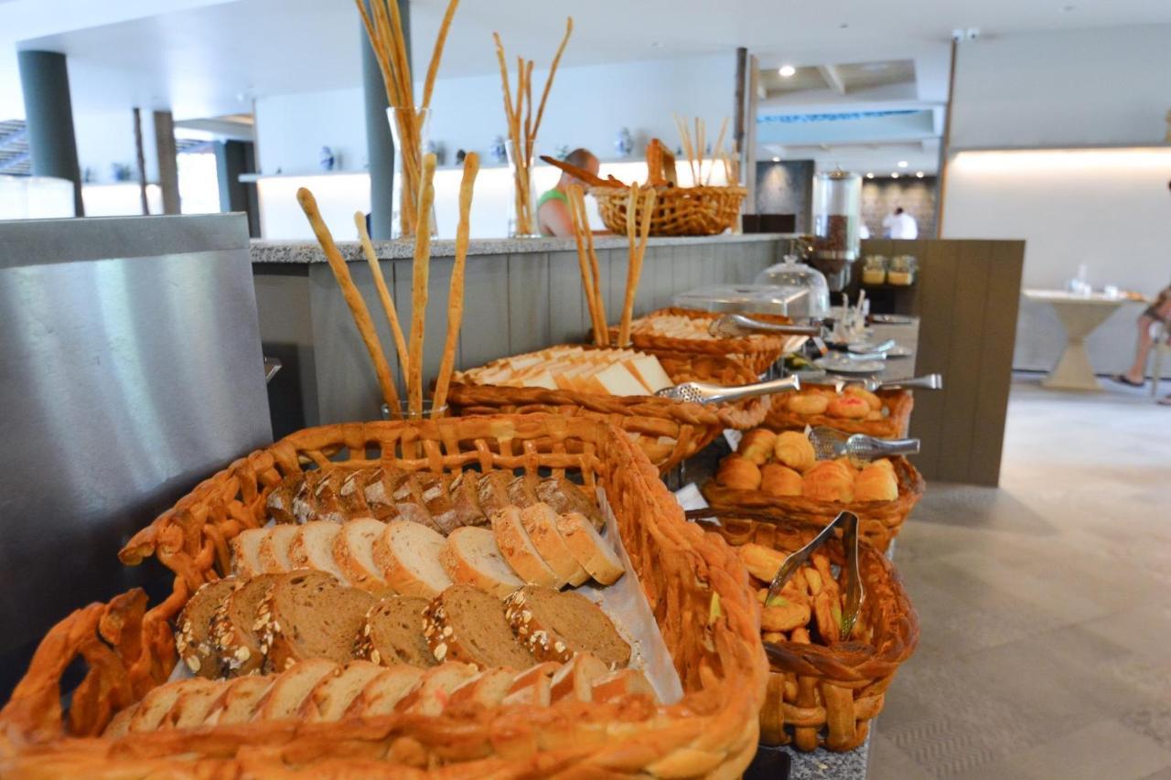 Andaman Cannacia Resort & Spa - Sha Extra Plus Ката-Бич Экстерьер фото A bread station at a buffet